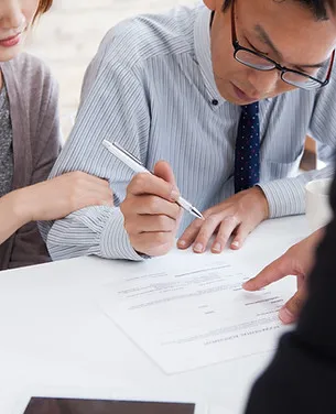 A professional reviewing a financial document